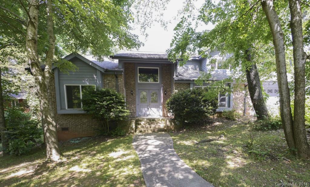 8108 Rising Meadow Road Charlotte, NC 28277 - Photo 1 of 21 a view of a house with a tree in the yard