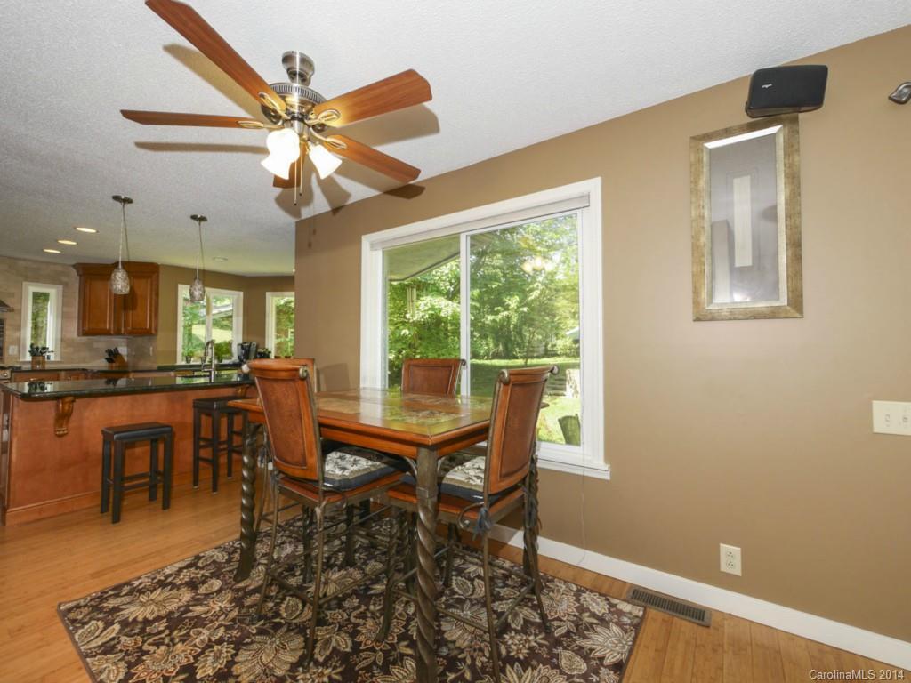 8108 Rising Meadow Road Charlotte, NC 28277 - Photo 12 of 21 a view of a dining room with furniture window and wooden floor