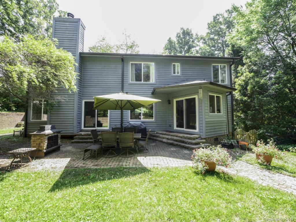 8108 Rising Meadow Road Charlotte, NC 28277 - Photo 21 of 21 a backyard of a house with yard fire pit and outdoor seating