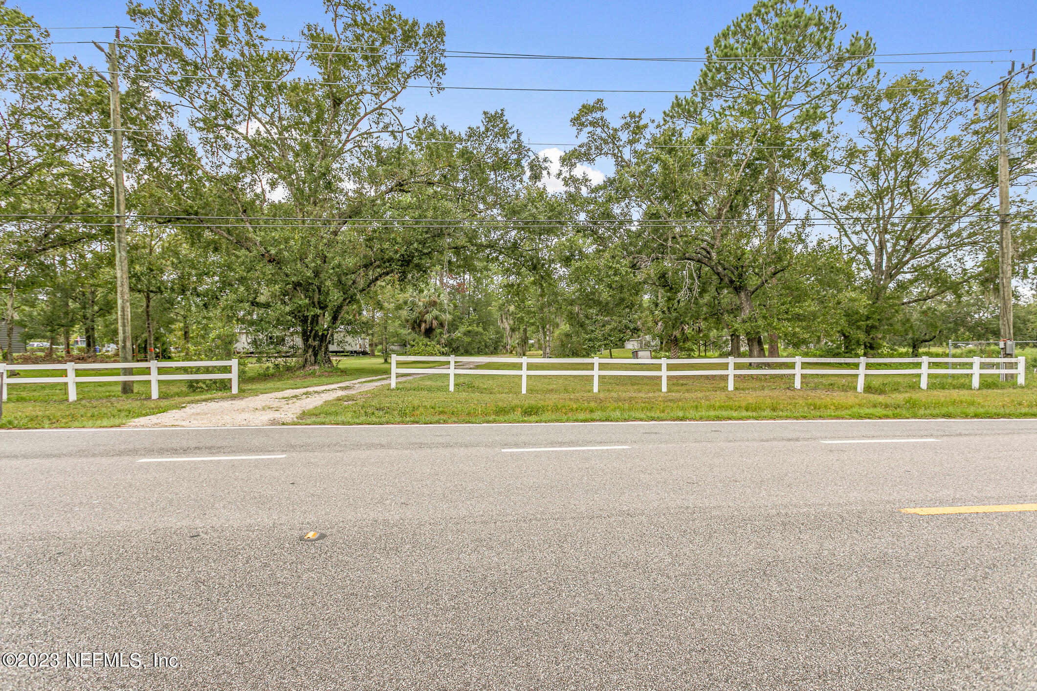 2555 Pacetti Road, Unit AC St. Augustine, FL 32092 - Photo 31 of 50 a view of a tennis court