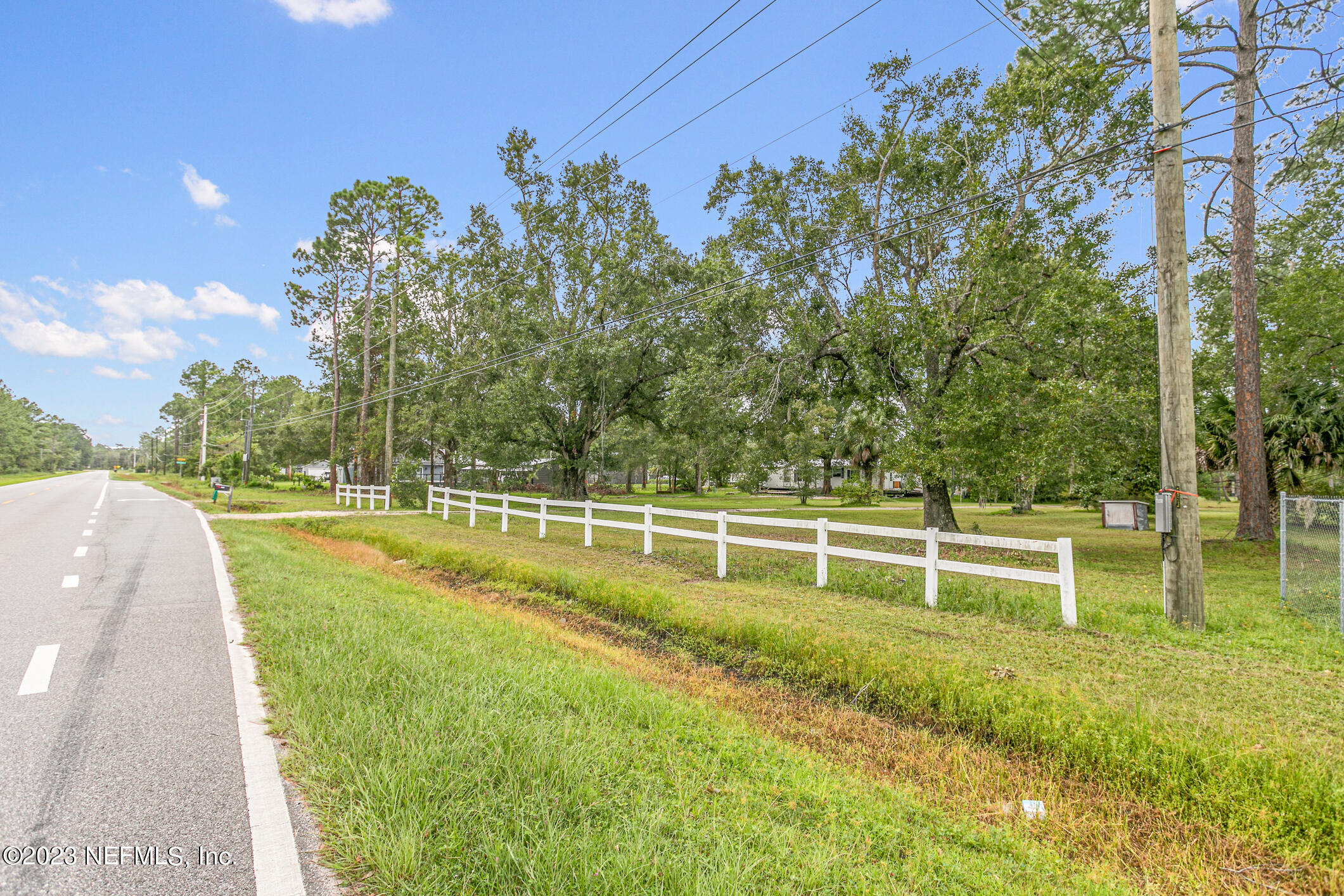 2555 Pacetti Road, Unit AC St. Augustine, FL 32092 - Photo 32 of 50 a view of a swimming pool with a yard