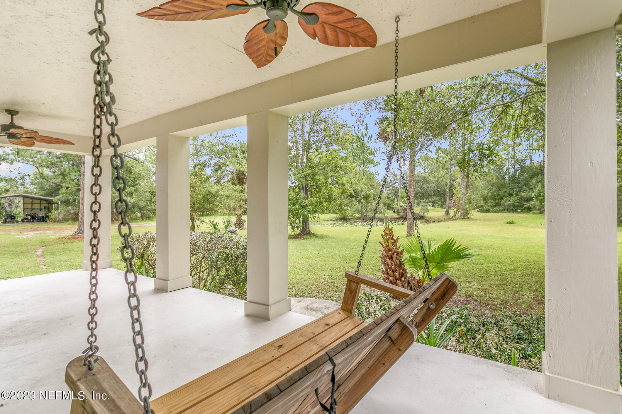 2555 Pacetti Road, Unit AC St. Augustine, FL 32092 - Photo 34 of 50 a view of a room and balcony with a bed