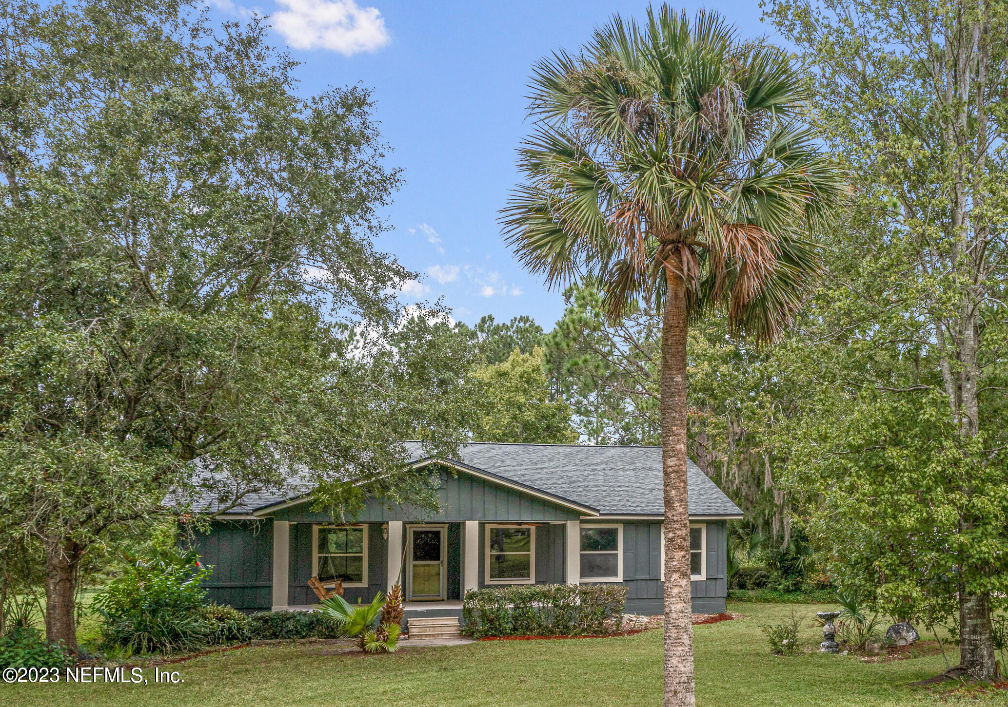 2555 Pacetti Road, Unit AC St. Augustine, FL 32092 - Photo 43 of 50 a front view of a house with garden