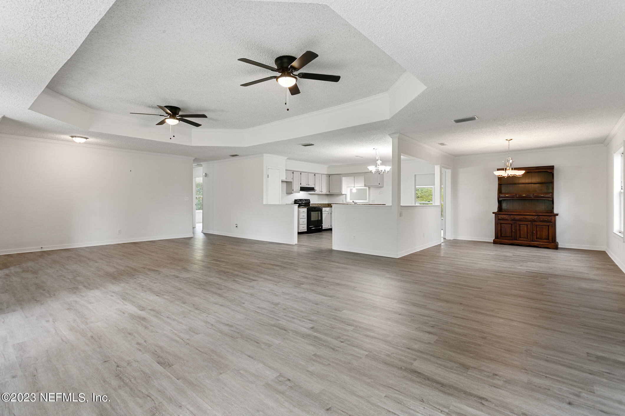 2555 Pacetti Road, Unit AC St. Augustine, FL 32092 - Photo 10 of 50 a view of a kitchen with a sink and a stove top oven