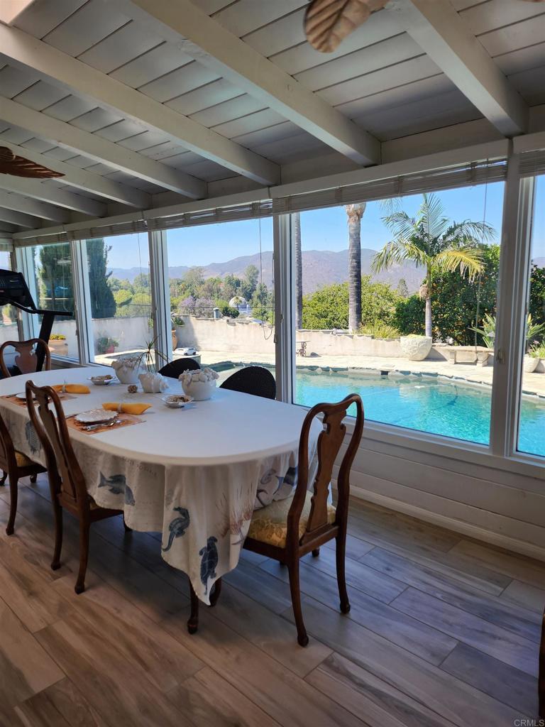 1001 Riverview Drive Fallbrook, CA 92028 - Photo 20 of 36 a view of a dining room with furniture window and wooden floor