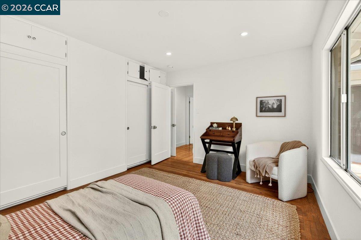24 Las Vegas Road Orinda, CA 94563 - Photo 29 of 47 a bedroom with a bed and wooden floor