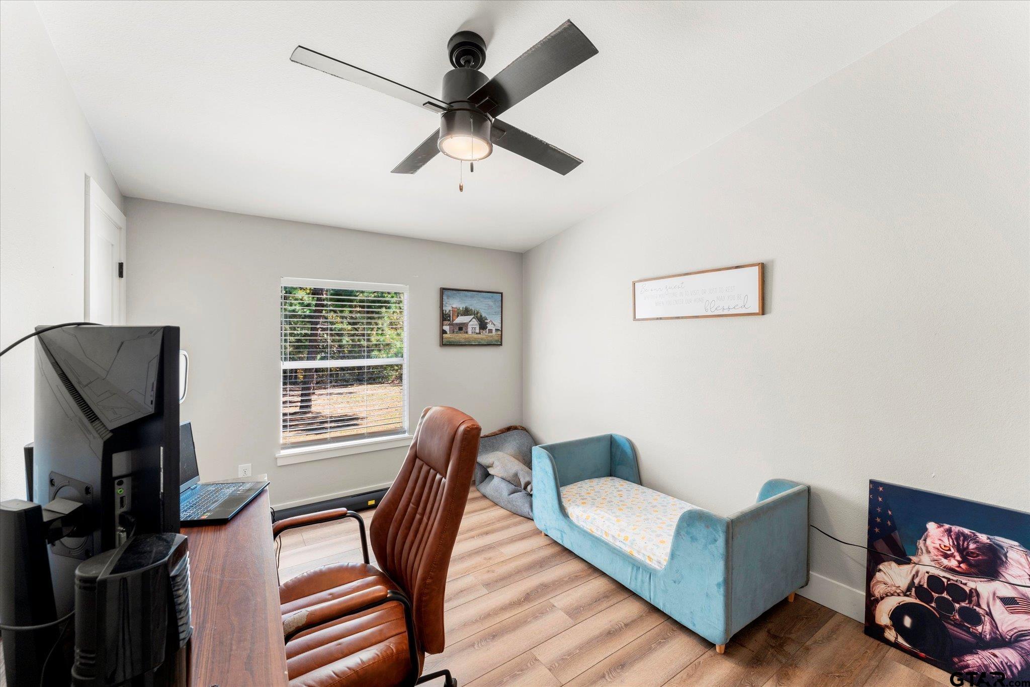 170 Private Road Leesburg, TX 75451 - Photo 40 of 46 a living room with furniture and a flat screen tv