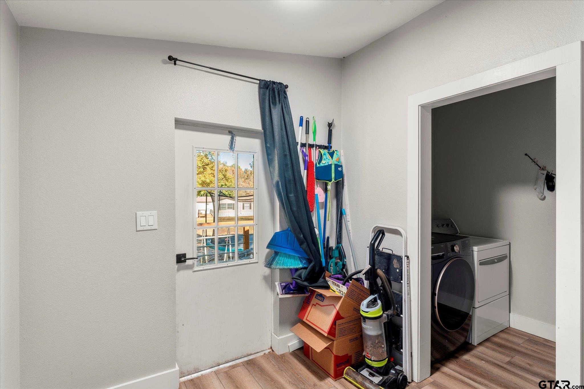 170 Private Road Leesburg, TX 75451 - Photo 41 of 46 a view of a room with gym equipment