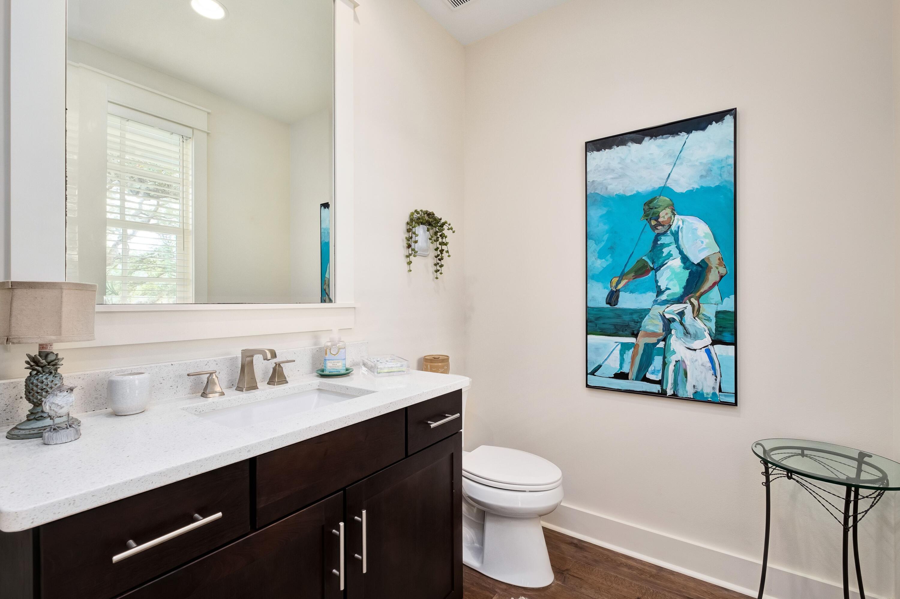 41 Carson Court Miramar Beach, FL 32550 - Photo 19 of 67 a bathroom with a toilet a sink and mirror