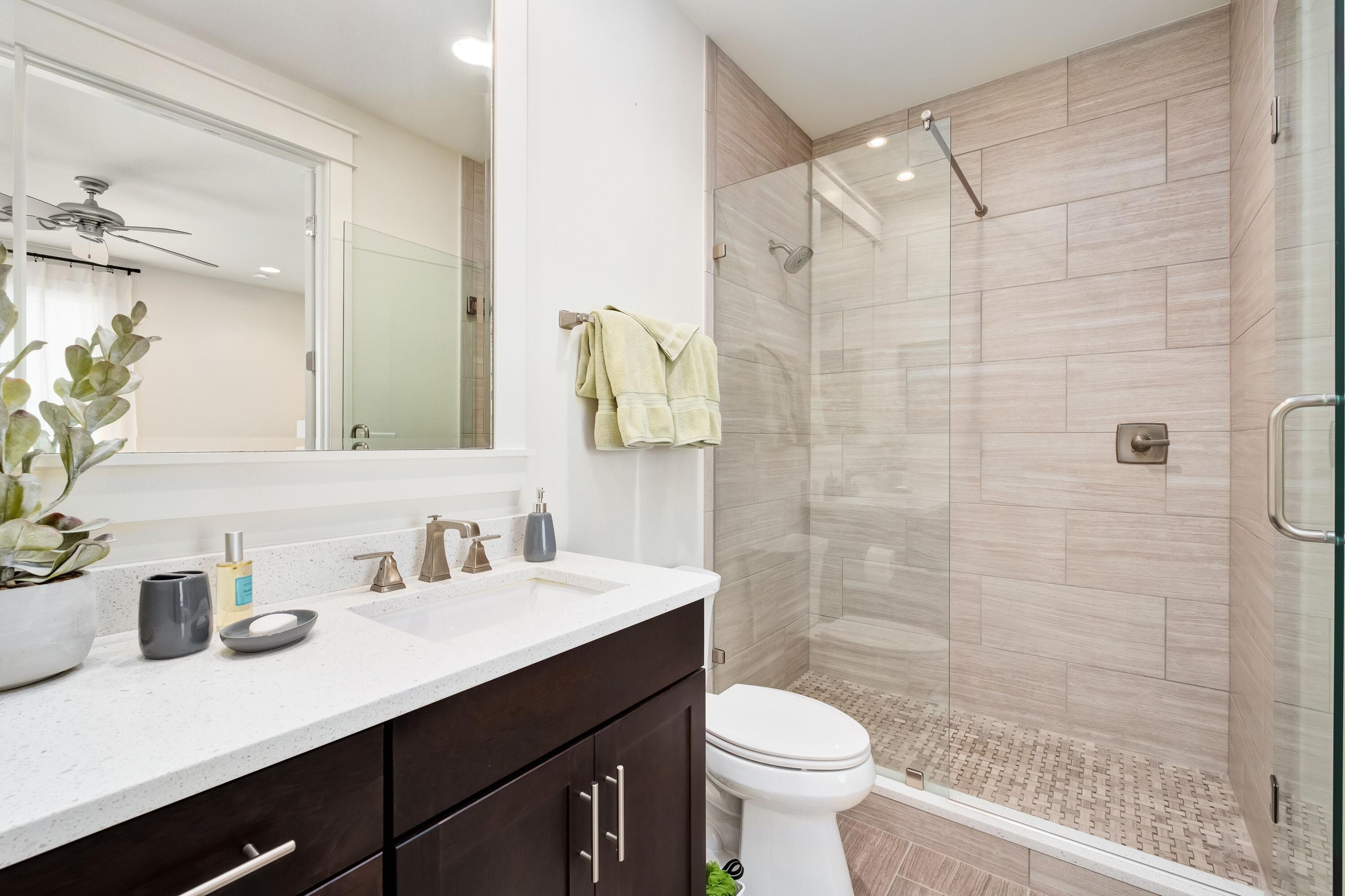 41 Carson Court Miramar Beach, FL 32550 - Photo 24 of 67 a bathroom with a sink a toilet a mirror and shower