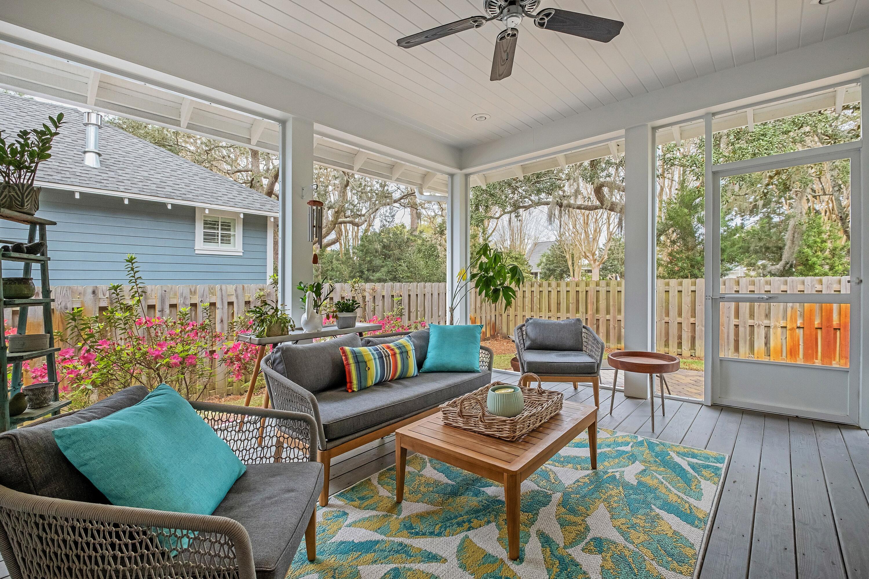 41 Carson Court Miramar Beach, FL 32550 - Photo 28 of 67 a living room with furniture and a floor to ceiling window