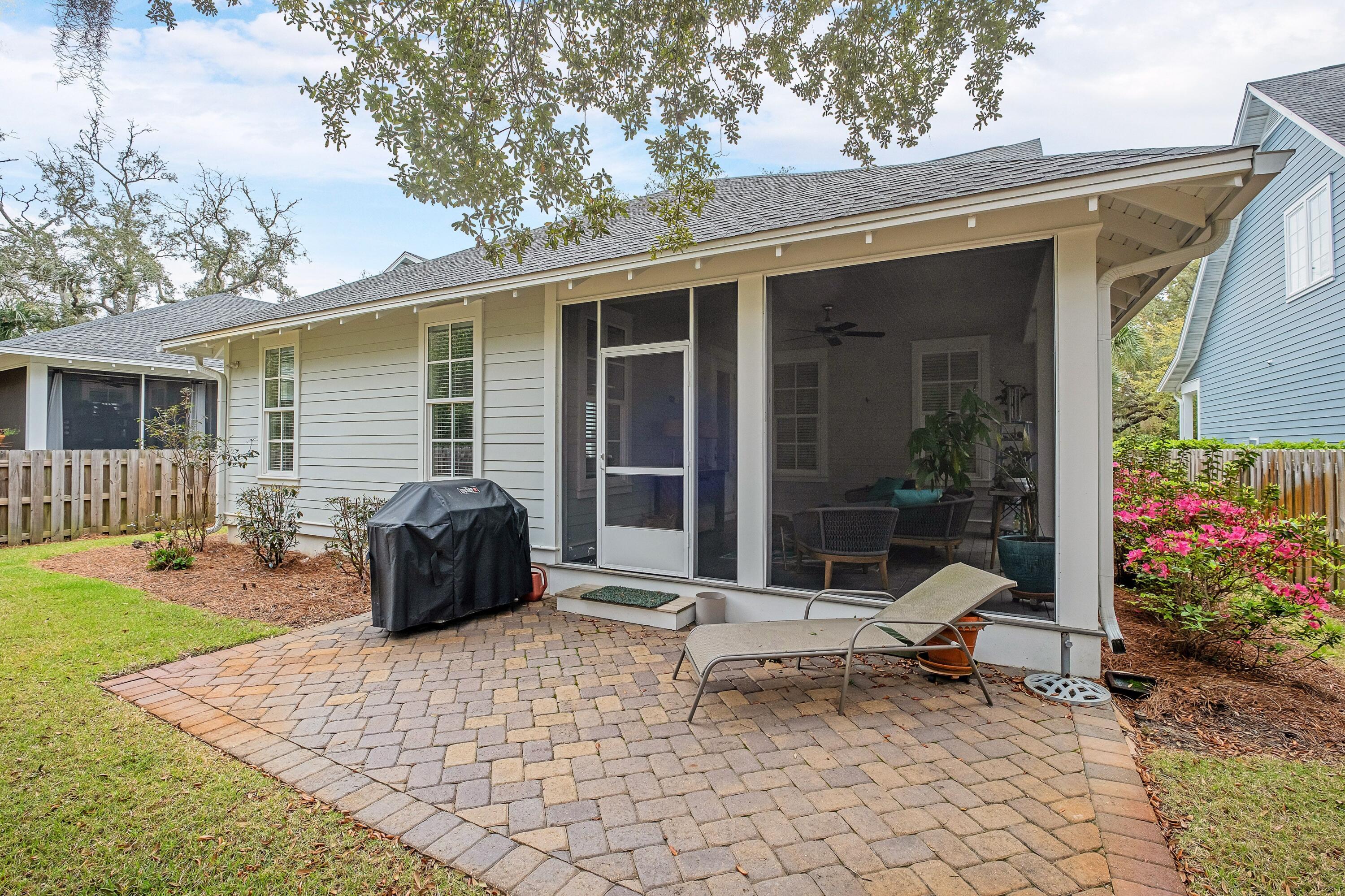 41 Carson Court Miramar Beach, FL 32550 - Photo 32 of 67 a view of a house with backyard and sitting area