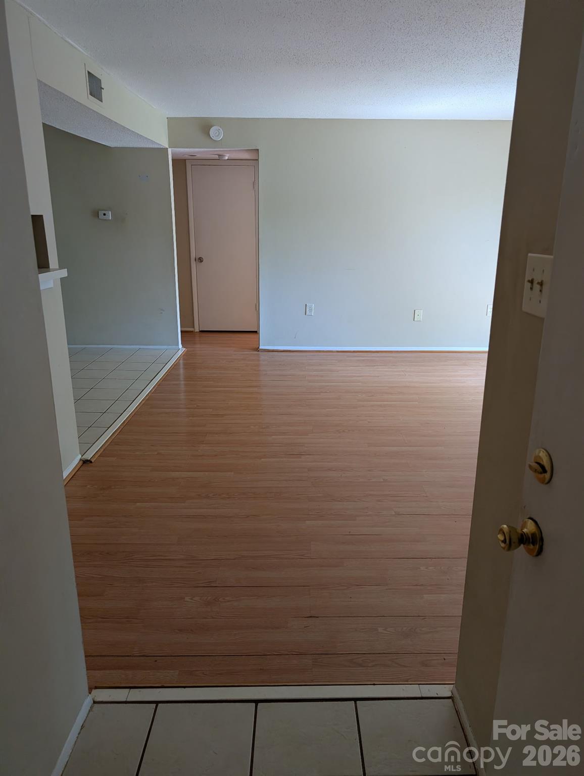 5012 Sardis Road, Unit D Charlotte, NC 28270 - Photo 11 of 12 wooden floor in an empty room