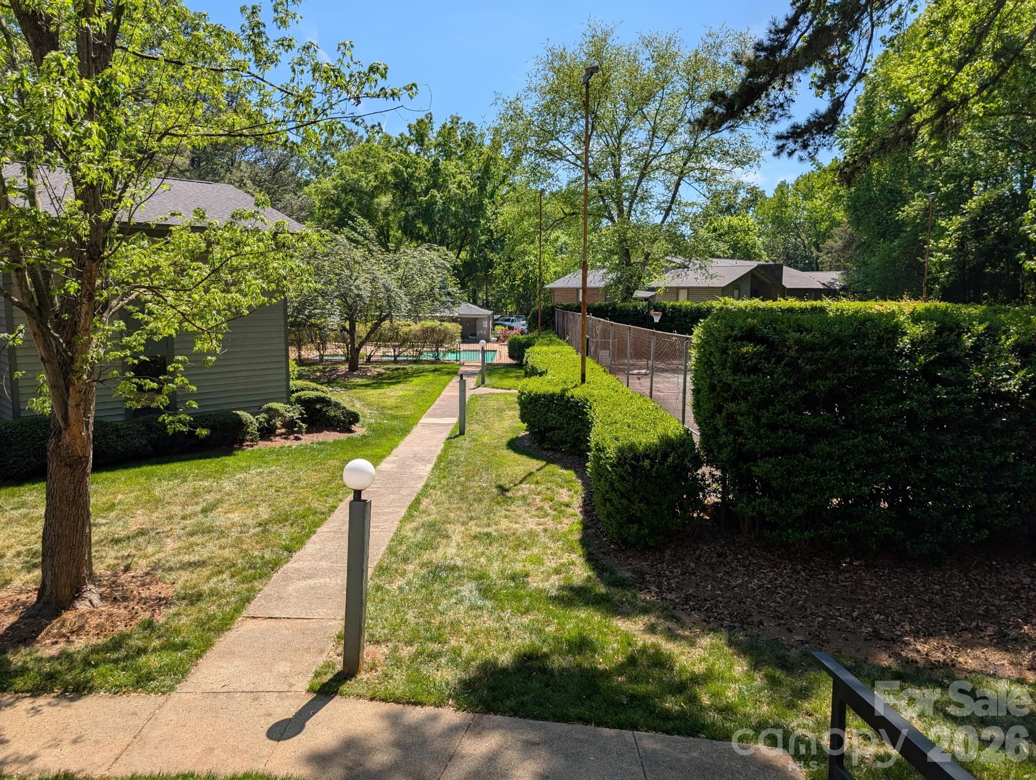 5012 Sardis Road, Unit D Charlotte, NC 28270 - Photo 6 of 12 a view of a swimming pool with a patio
