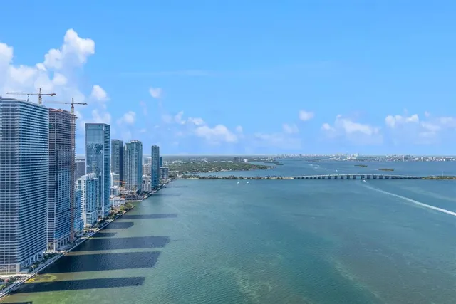 a view of a city with tall buildings