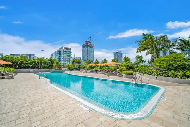 a view of a lake with a building in the background