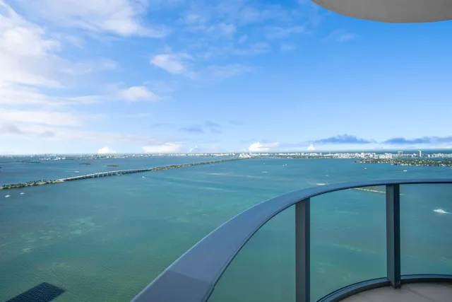 a view of a lake with a big yard