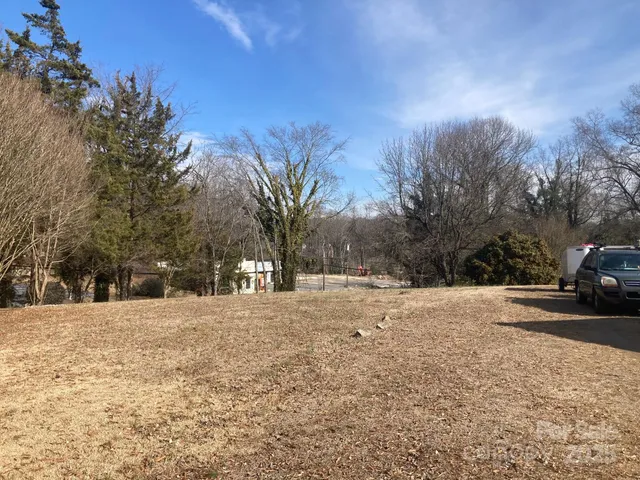 a view of road and trees