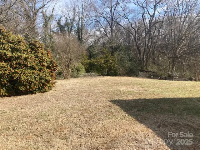 a view of yard covered with snow