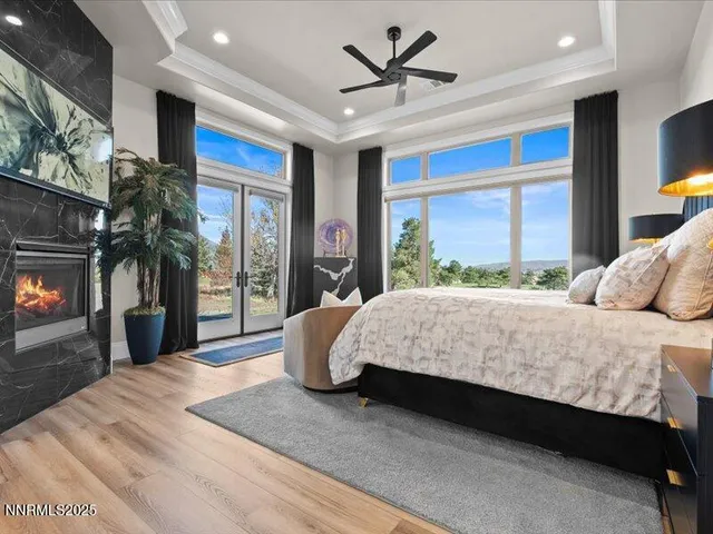 a large bathroom with a tub sink and mirror