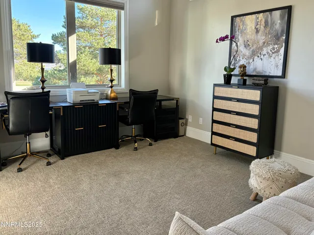 a bathroom with a sink a toilet and shower curtain