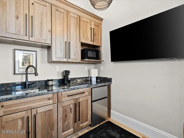 a balcony with furniture and city view