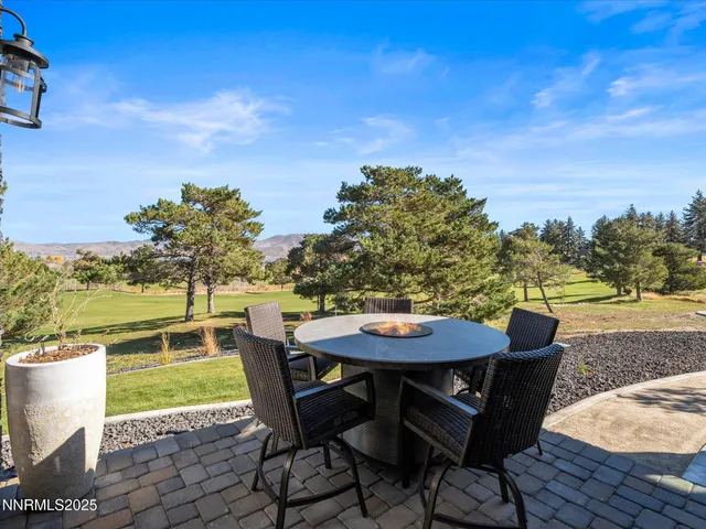a view of a terrace with a lake view