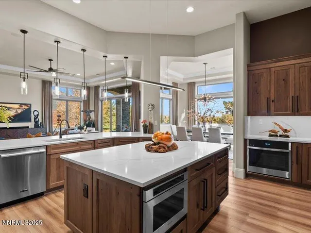 a kitchen with a stove a sink and a refrigerator