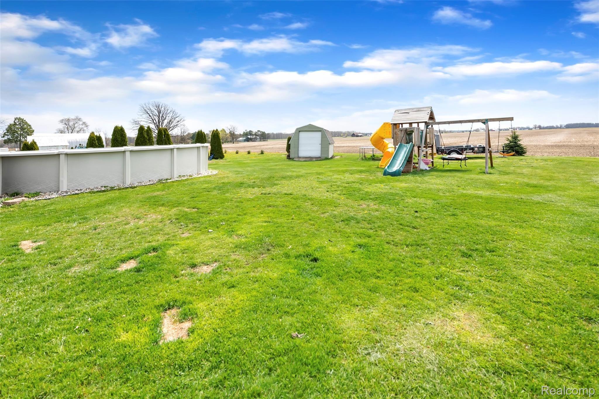 2185 Peet Road New Lothrop, MI 48460 - Photo 25 of 29 Every Child's Dream Backyard