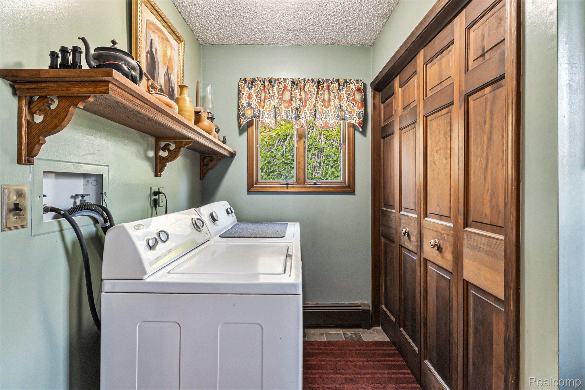 7280 Groveland Road Holly, MI 48442 - Photo 24 of 48 main floor laundry