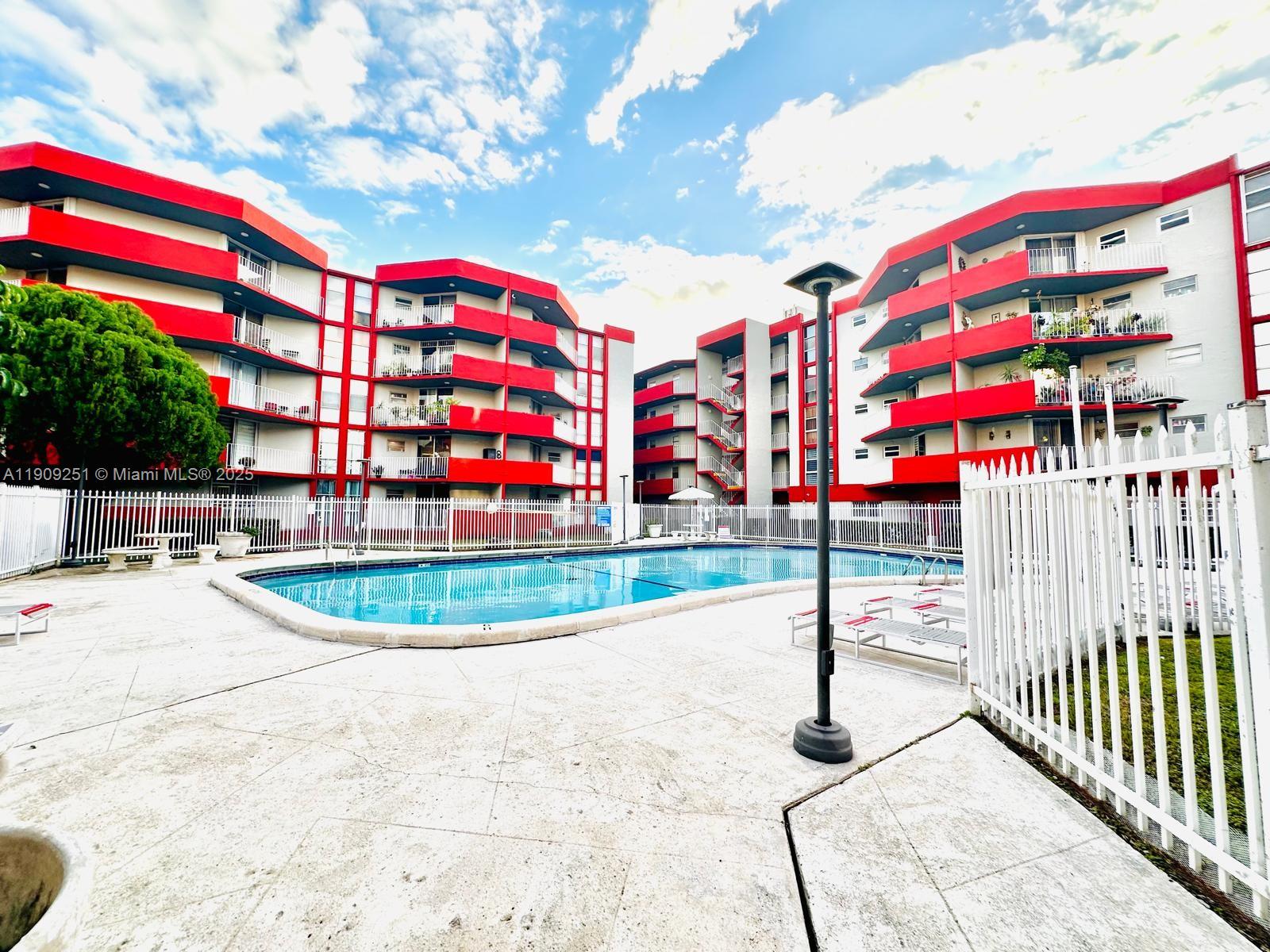 1750 West 46th Street, Unit 535 Hialeah, FL 33012 - Photo 22 of 26 a building view with outdoor space