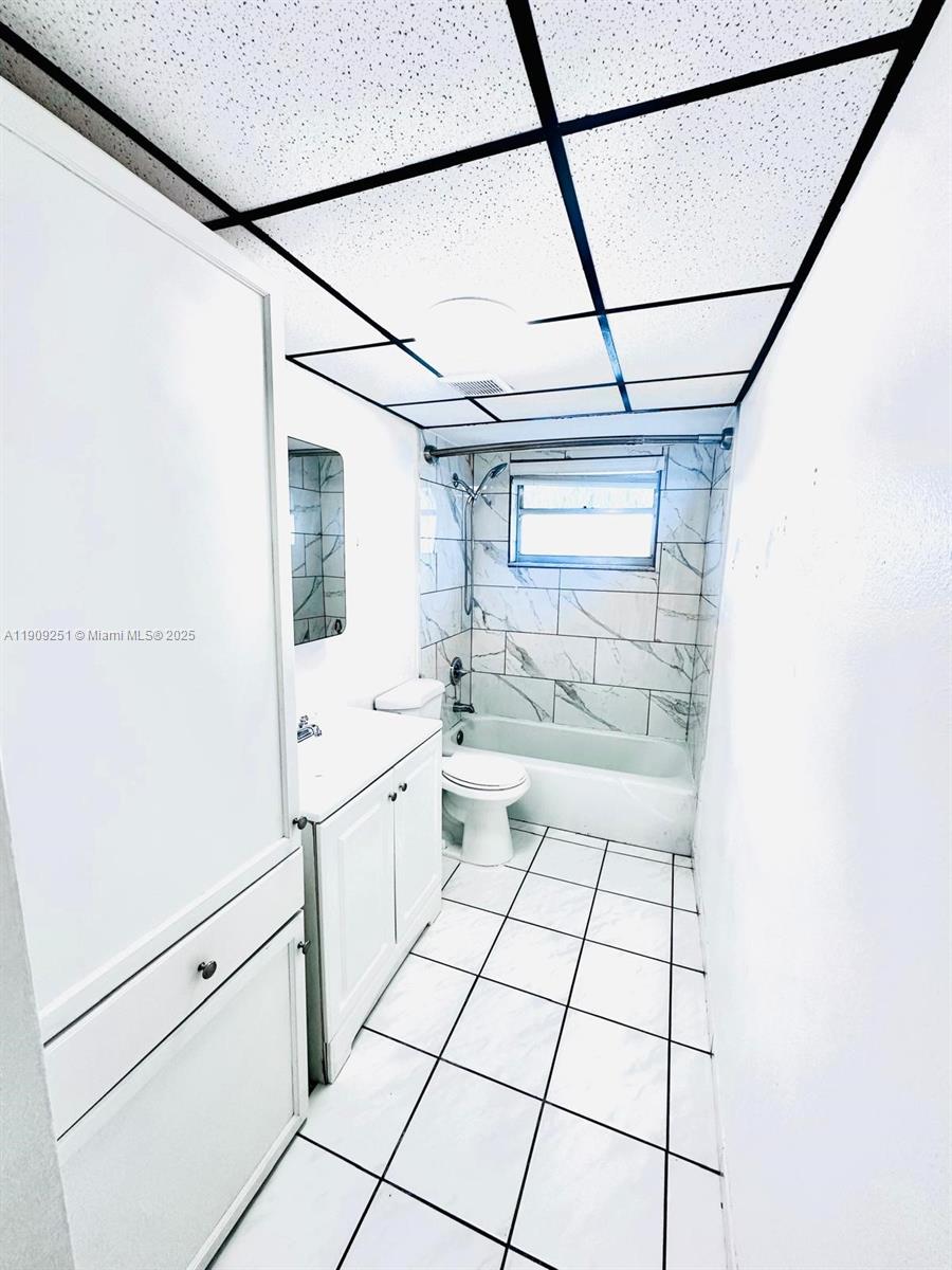 1750 West 46th Street, Unit 535 Hialeah, FL 33012 - Photo 8 of 26 a bathroom with a sink toilet and shower