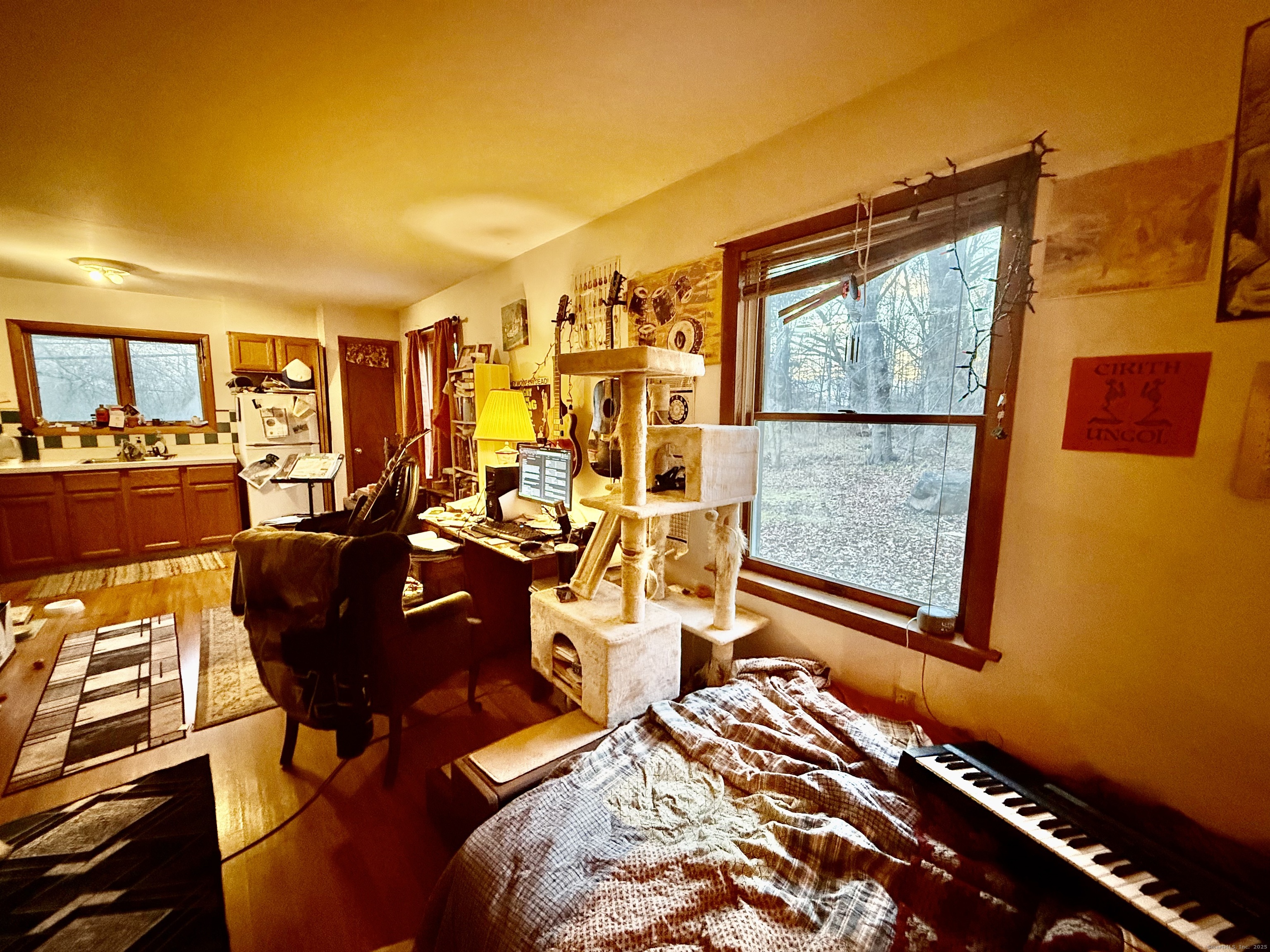226 West High Street East Hampton, CT 06424 - Photo 15 of 21 a view of a living room with furniture and a window