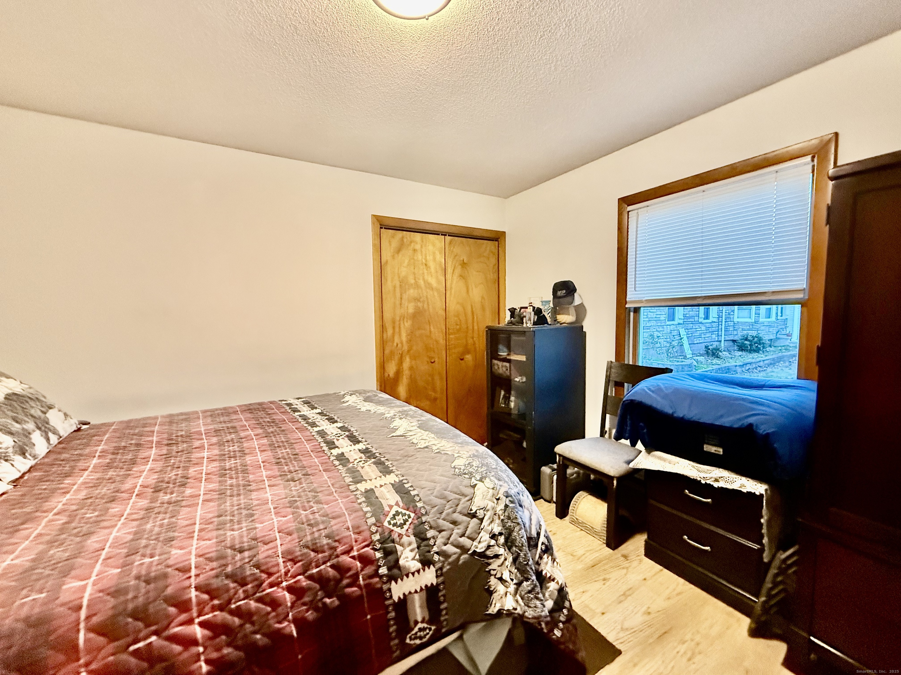 226 West High Street East Hampton, CT 06424 - Photo 17 of 21 a bedroom with a bed and a window