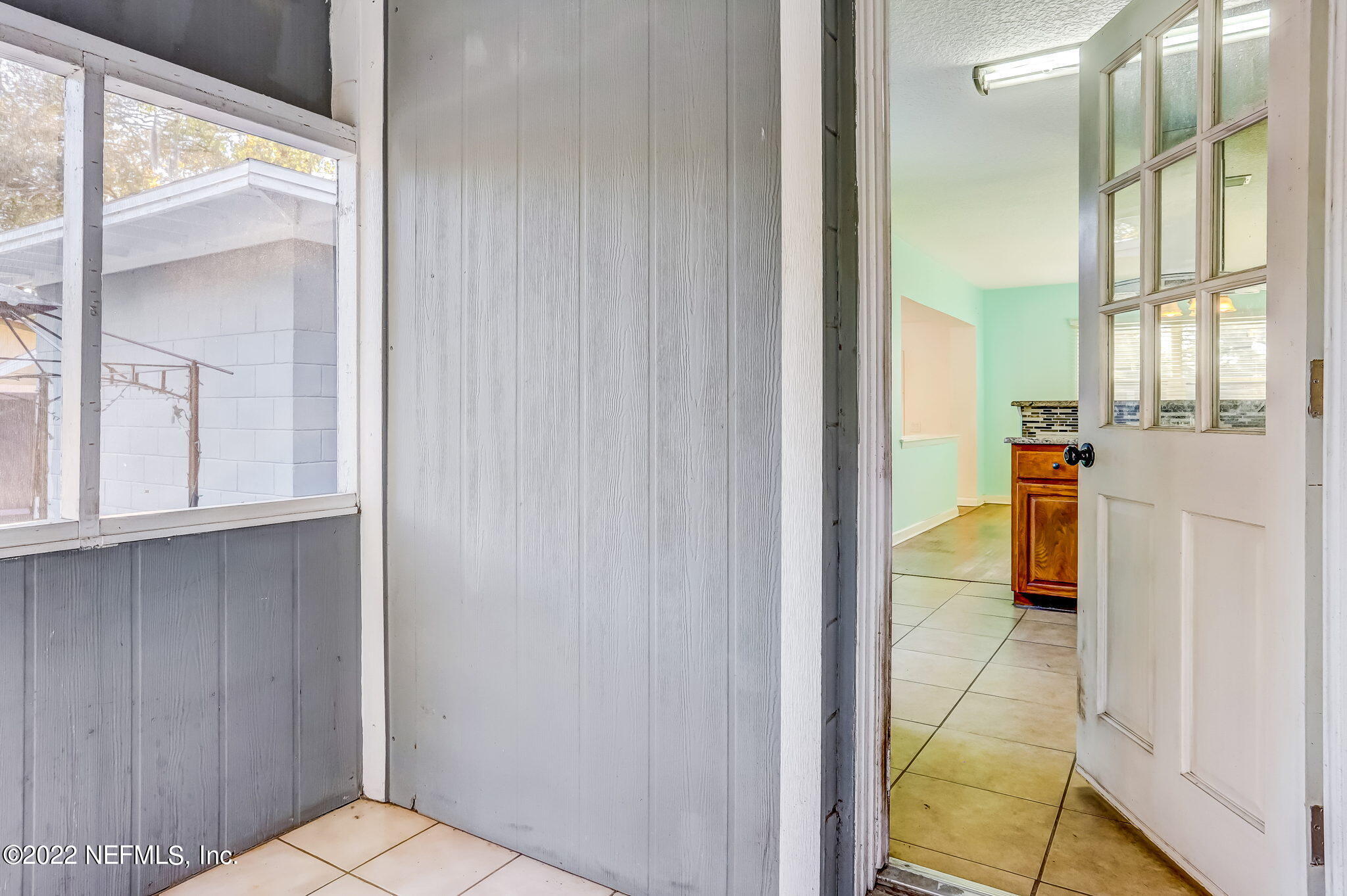 2705 Gaillardia Road Jacksonville, FL 32211 - Photo 45 of 55 Screened porch outside of kitchen
