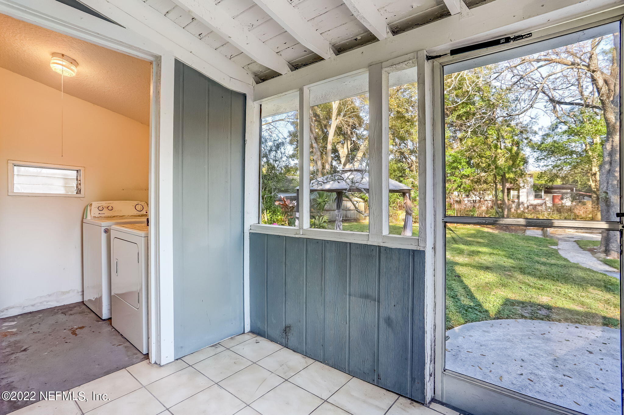 2705 Gaillardia Road Jacksonville, FL 32211 - Photo 47 of 55 Screened porch and laundry