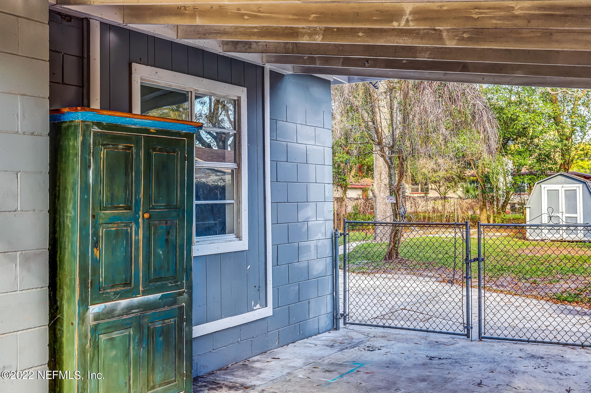 2705 Gaillardia Road Jacksonville, FL 32211 - Photo 6 of 55 Carport with gate into backyard