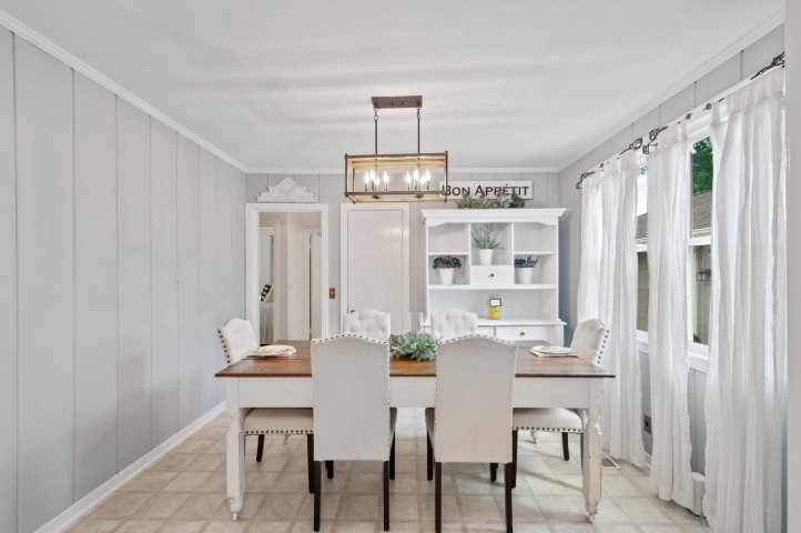 503 Perkins Drive Franklin, TN 37064 - Photo 12 of 40 a view of a dining room with furniture and chandelier