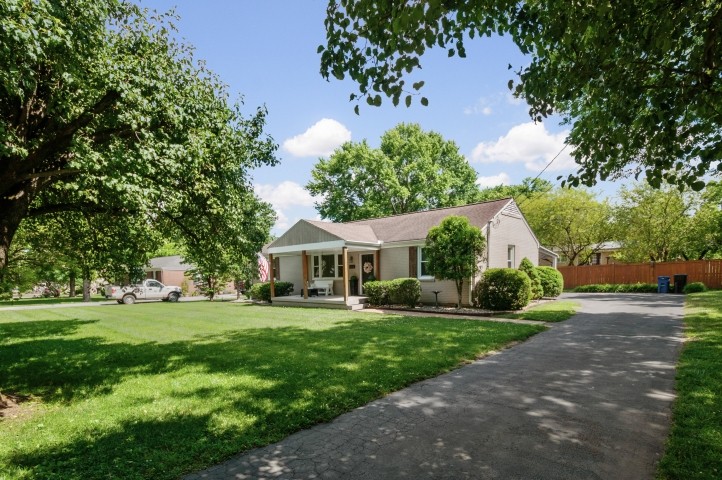 503 Perkins Drive Franklin, TN 37064 - Photo 2 of 40 a front view of a house with a yard