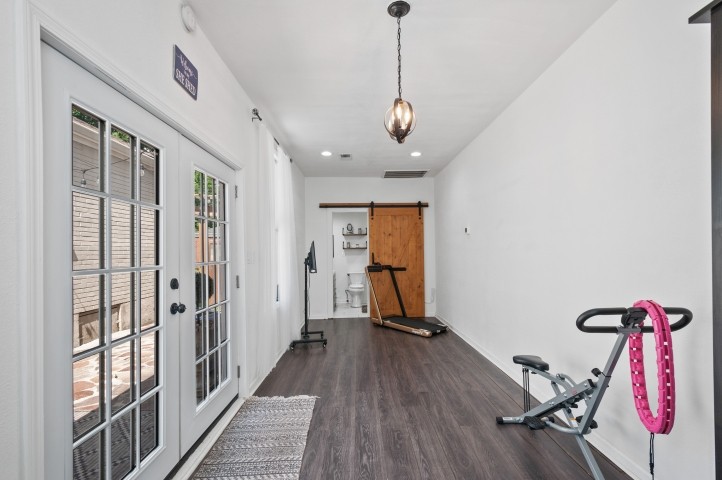503 Perkins Drive Franklin, TN 37064 - Photo 23 of 40 a view of a hallway with wooden floor and stairs