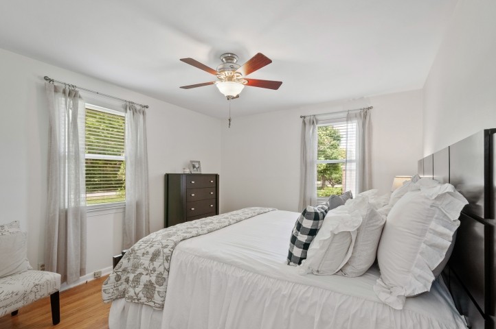503 Perkins Drive Franklin, TN 37064 - Photo 26 of 40 a bedroom with a bed and a chandelier