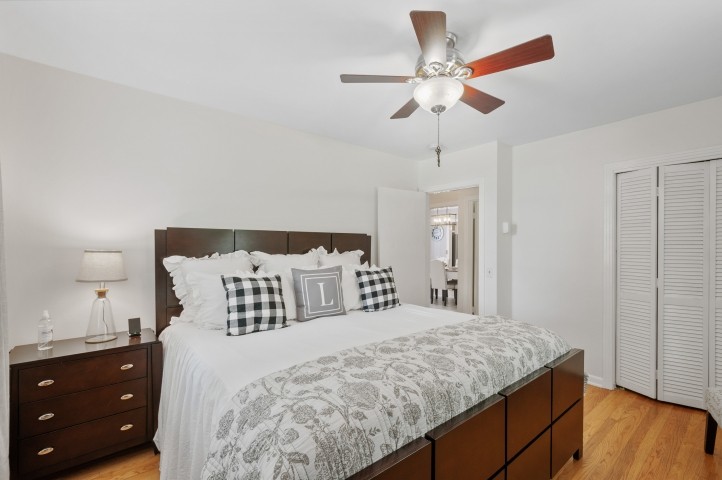 503 Perkins Drive Franklin, TN 37064 - Photo 27 of 40 a bedroom with a large bed and a chandelier