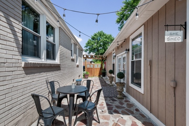 503 Perkins Drive Franklin, TN 37064 - Photo 33 of 40 a view of a patio with table and chairs and potted plants