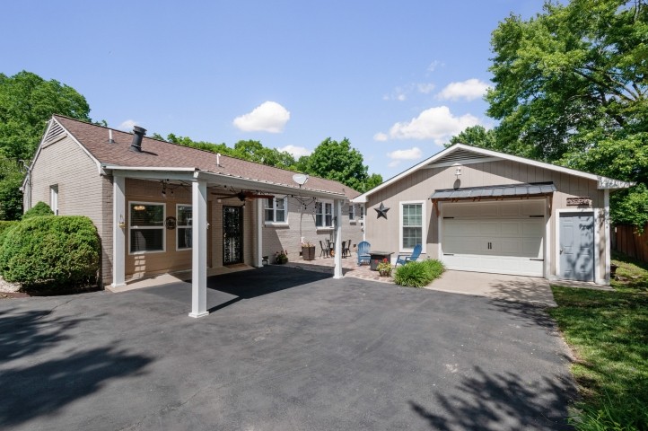 503 Perkins Drive Franklin, TN 37064 - Photo 34 of 40 a view of a house with a yard and potted plants
