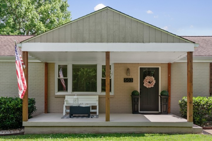 503 Perkins Drive Franklin, TN 37064 - Photo 5 of 40 a front view of a house with a yard