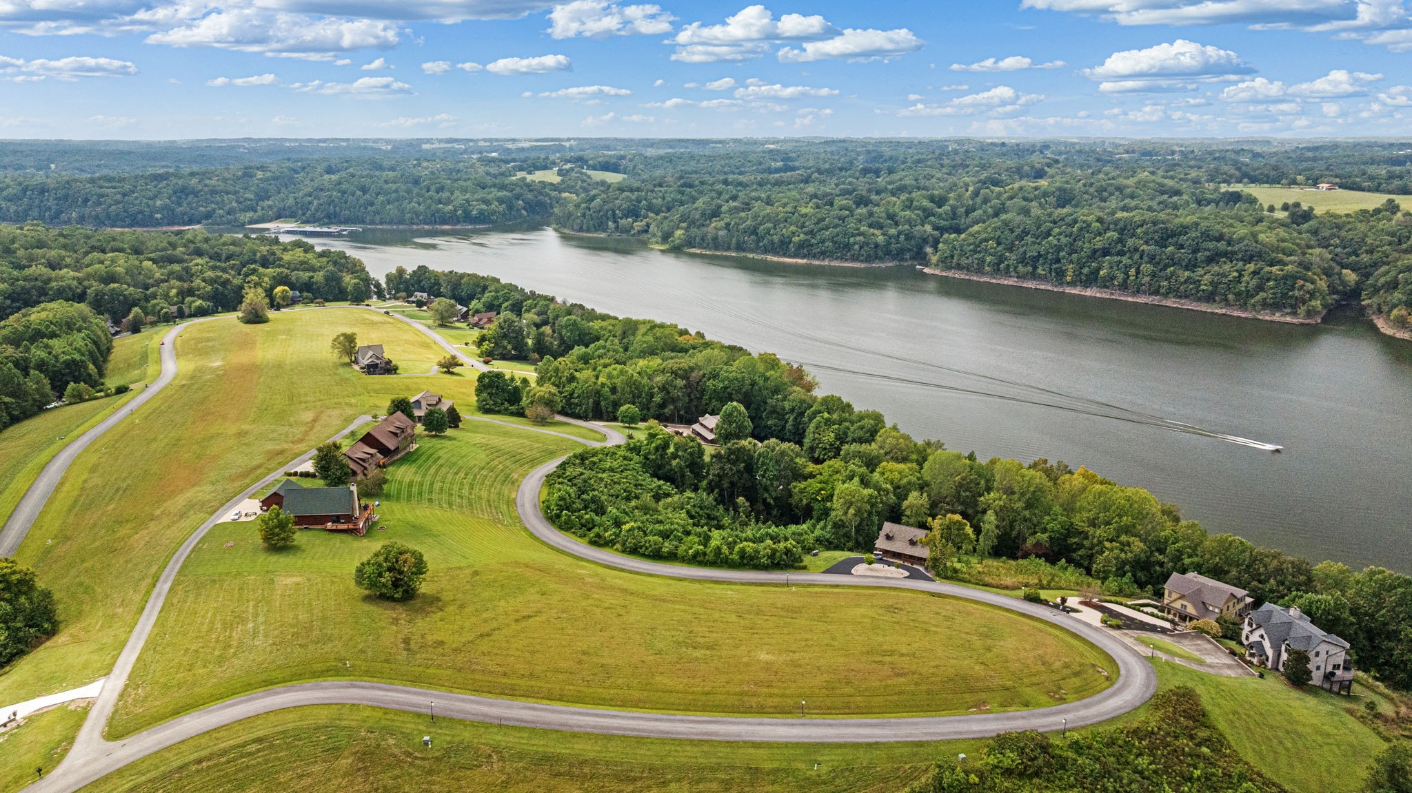 53 Eagle Point Drive Austin, KY 42123 - Photo 5 of 20 an aerial view of a house with a swimming pool outdoor seating and yard