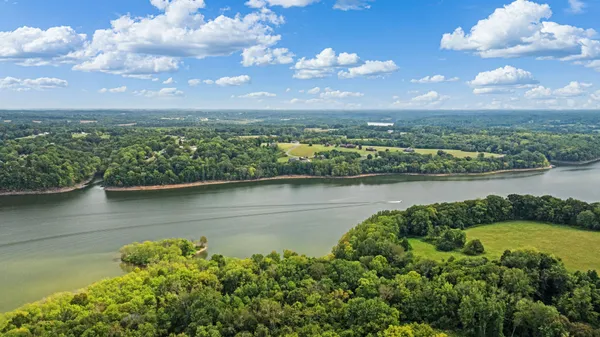 a view of a lake with a city