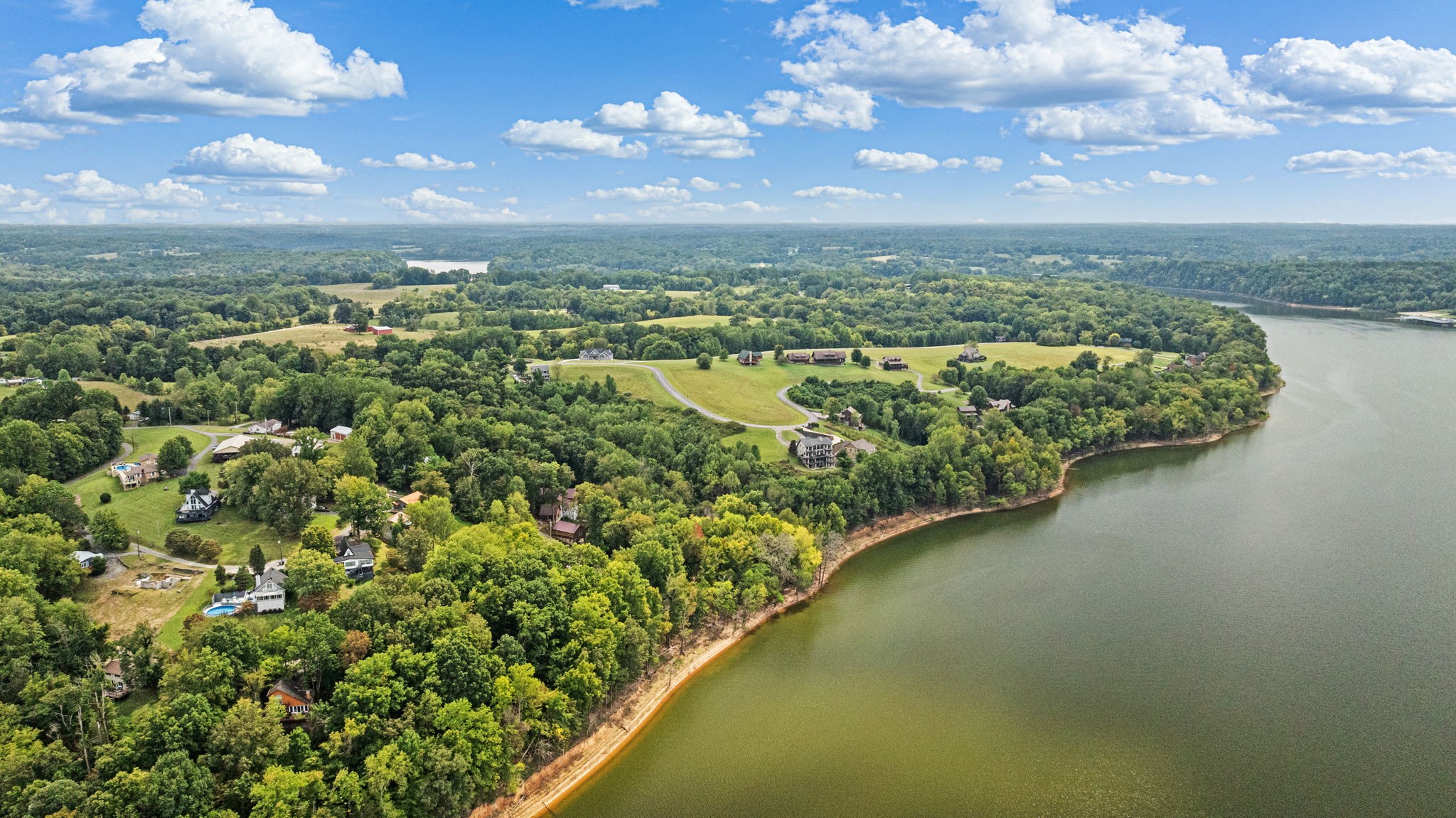 53 Eagle Point Drive Austin, KY 42123 - Photo 10 of 20 a view of a lake with a city