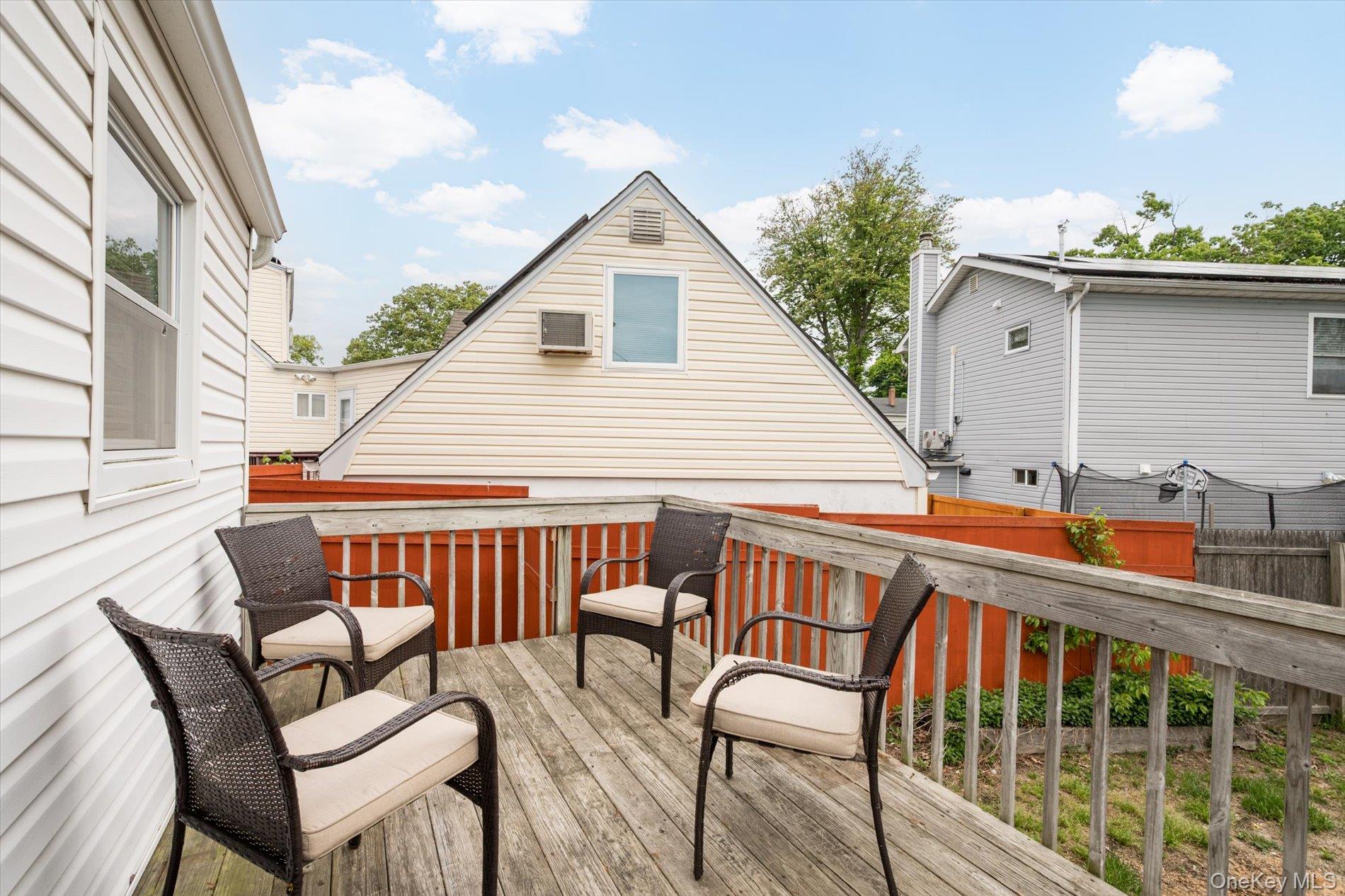 675 Little E Neck Road West Babylon, NY 11704 - Photo 16 of 20 a view of a chairs and tables in the balcony
