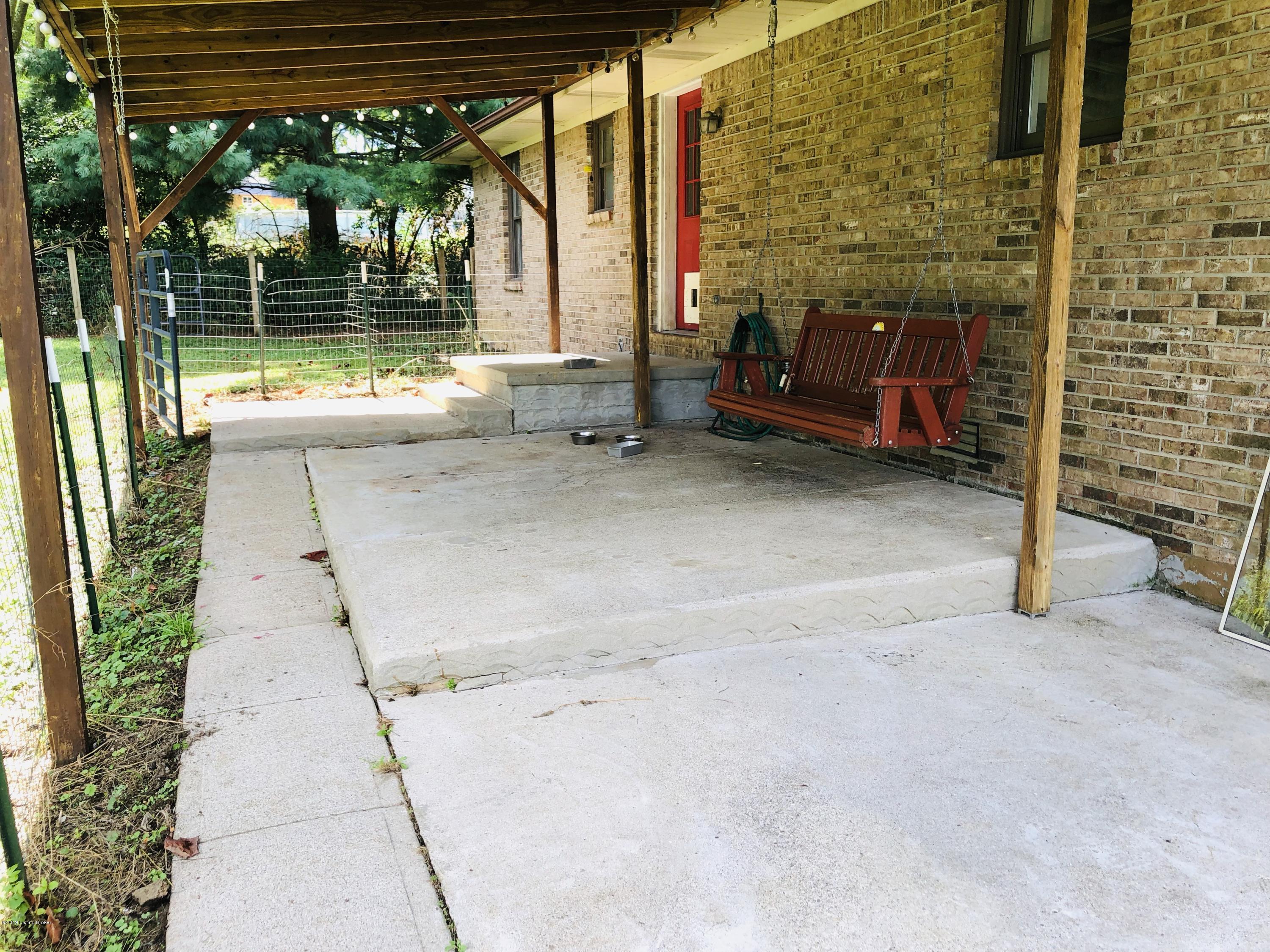 128 Windy Ridge Road Bedford, KY 40006 - Photo 17 of 20 Rear Covered Patio